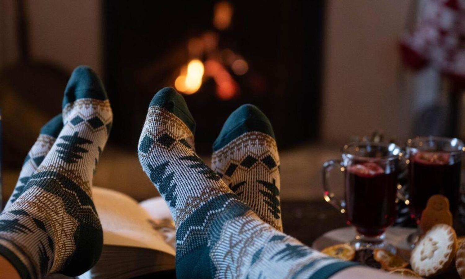 Woolly socks in front of the fire